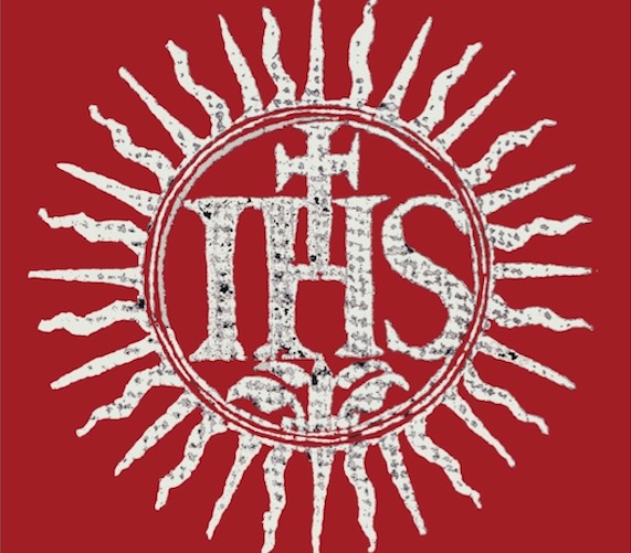 The Jesuit symbol in white against a red background